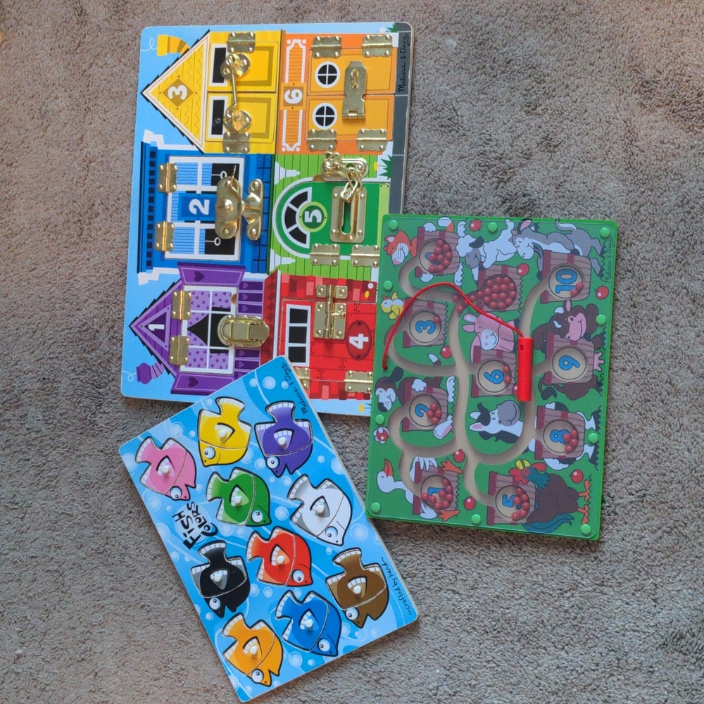 Three Melissa and Doug wooden puzzles
